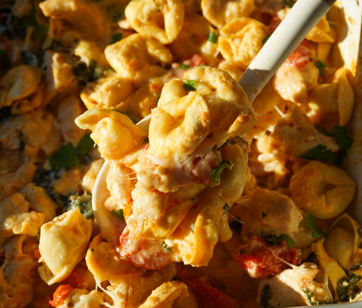 baked chicken tortellini with spinach tomatoes and feta
