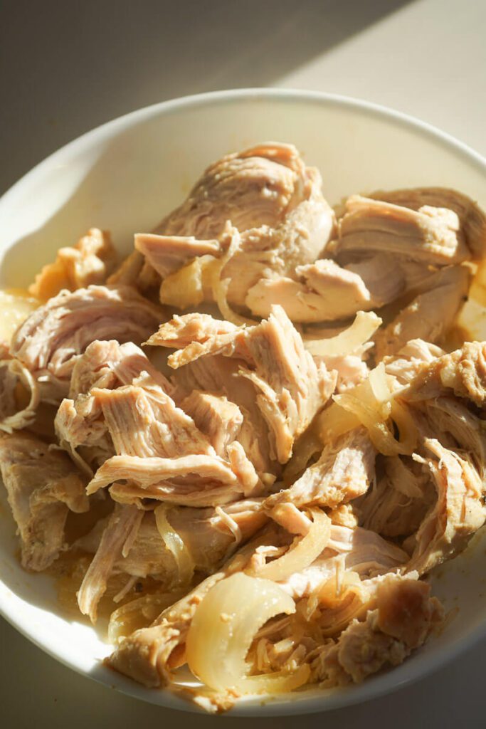 Freshly pressure-cooked chicken shredded into tender pieces and tossed in warm apple cider juices.